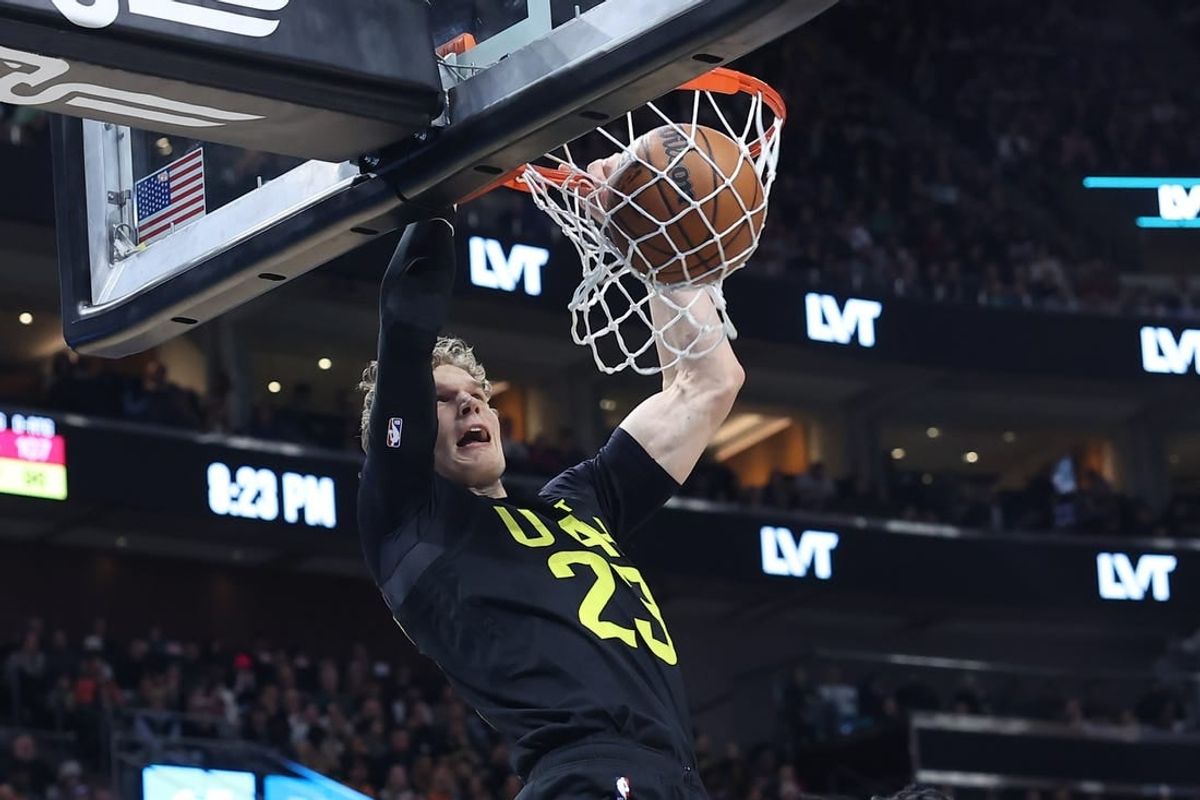 Jan 12, 2024; Salt Lake City, Utah, USA; Utah Jazz forward Lauri Markkanen (23) dunks the ball against the Toronto Raptors during the second quarter at Delta Center.