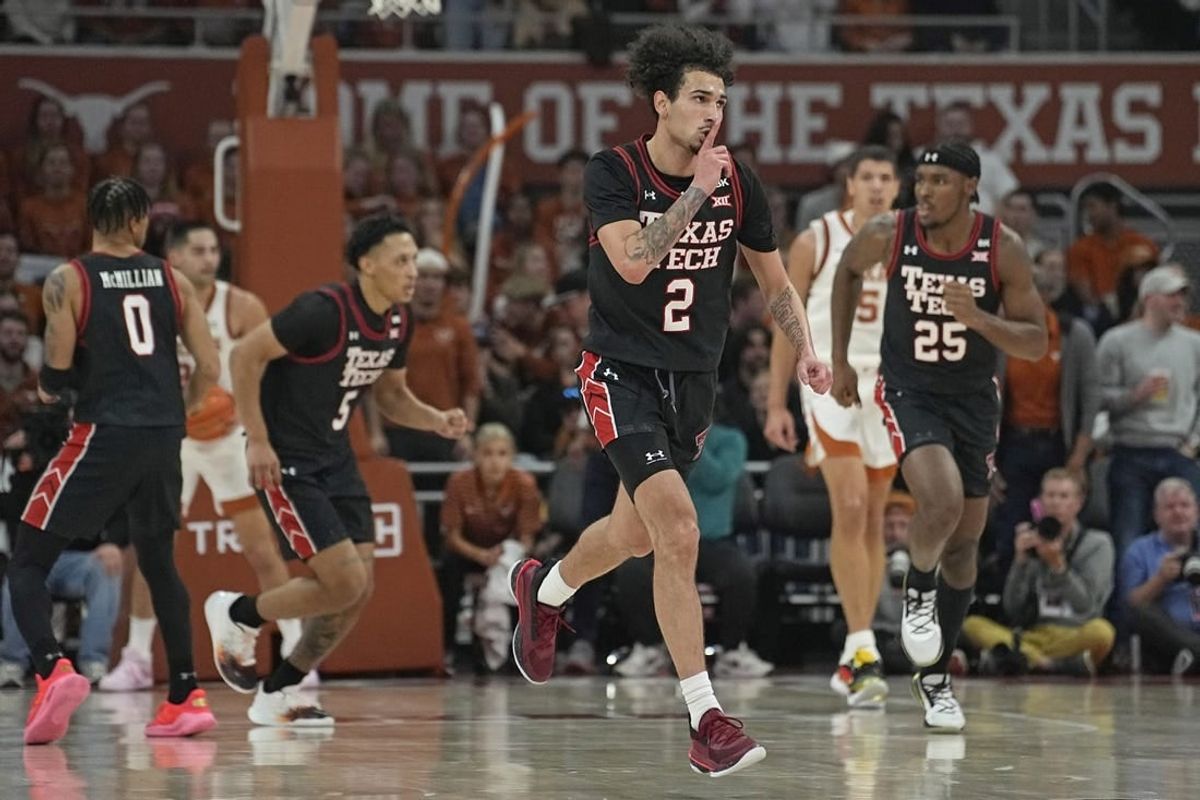 Jan 6, 2024; Austin, Texas, USA; Texas Tech Red Raiders guard Pop Isaacs (2) reacts after scoring a three point basket during the first half against the Texas Longhorns at Moody Center.
