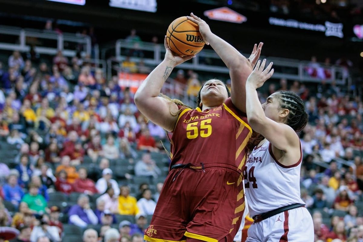 Mar 11, 2024; Kansas City, MO, USA; Iowa State Cyclones center Audi Crooks (55) shoots the ball around Oklahoma Sooners forward Skylar Vann (24) during the second half at T-Mobile Center.