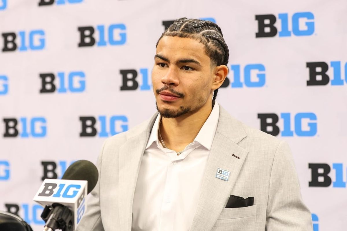 Oct 10, 2023; Minneapolis, MN, USA; Michigan Wolverines player Olivier Nkamhoua speaks to the media during the Big Ten basketball media days at Target Center.