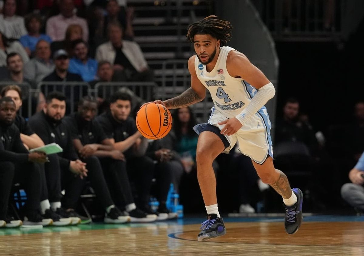 March 21, 2024, Charlotte, NC, USA; North Carolina Tar Heels guard RJ Davis (4) controls the ball against the Wagner Seahawks in the first round of the 2024 NCAA Tournament at the Spectrum Center.