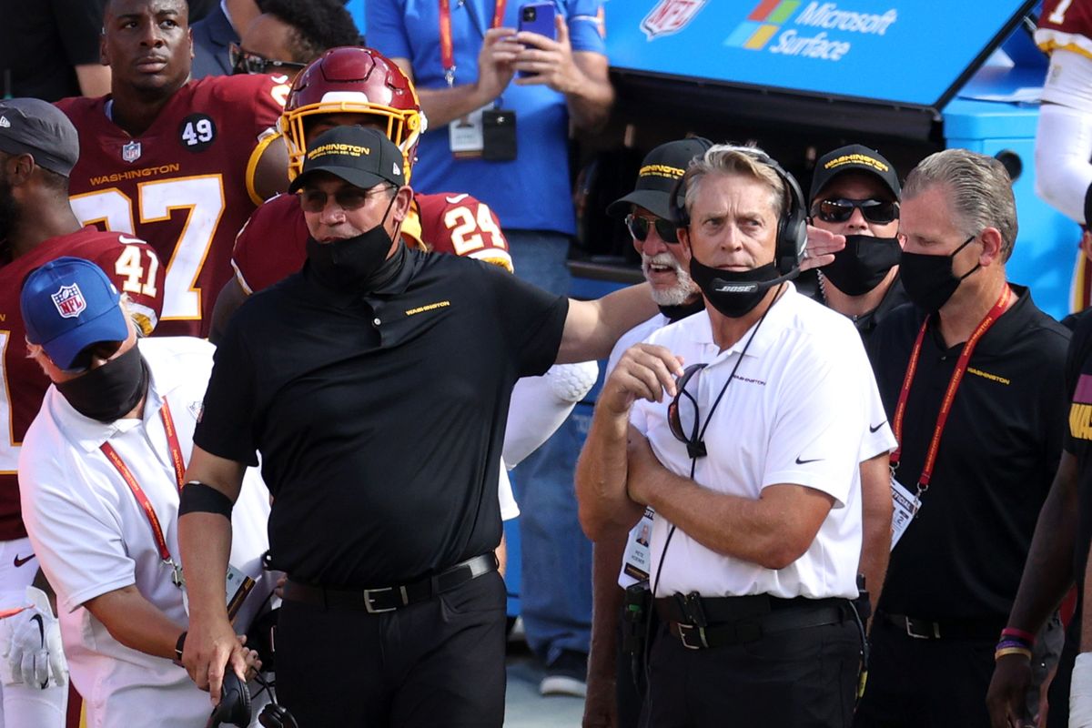 Ron Rivera (l.) fined Jack Del Rio $100,000 for his comments comparing Jan. 6 to Black Lives Matter protests.