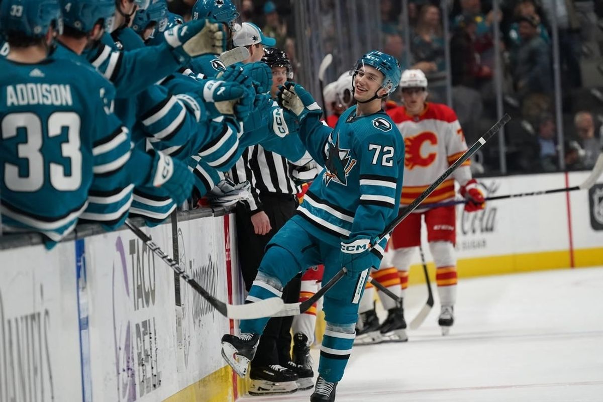 Apr 9, 2024; San Jose, California, USA; San Jose Sharks left wing William Eklund (72) scores in the first period against the Calgary Flames at SAP Center at San Jose.