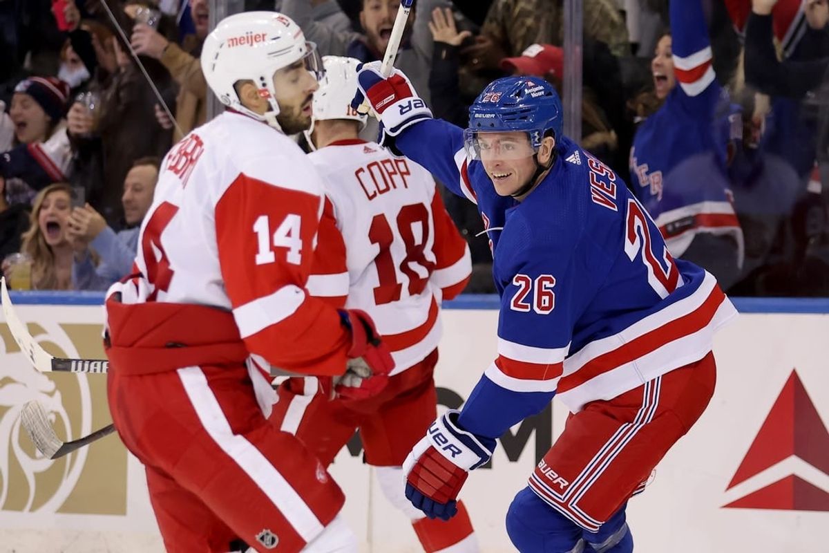 Nov 29, 2023; New York, New York, USA; New York Rangers left wing Jimmy Vesey (26) celebrates his game winning goal in front of Detroit Red Wings center Robby Fabbri (14) and center Andrew Copp (18) during the third period at Madison Square Garden.
