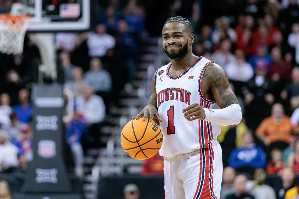 Mar 14, 2024; Kansas City, MO, USA; Houston Cougars guard Jamal Shead (1) brings the ball up court during the first half against the TCU Horned Frogs at T-Mobile Center.