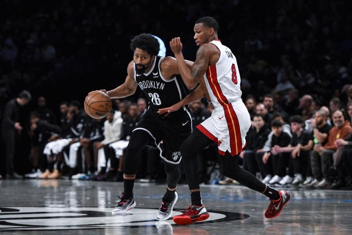 Nov 25, 2023; Brooklyn, New York, USA; Brooklyn Nets guard Spencer Dinwiddie (26) drives against Miami Heat forward Jamal Cain (8) during the third quarter at Barclays Center.