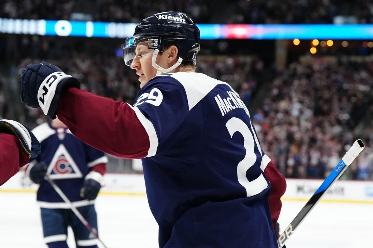 Feb 27, 2024; Denver, Colorado, USA;Colorado Avalanche center Nathan MacKinnon (29) celebrates his goal in the second period against the Dallas Stars at Ball Arena.