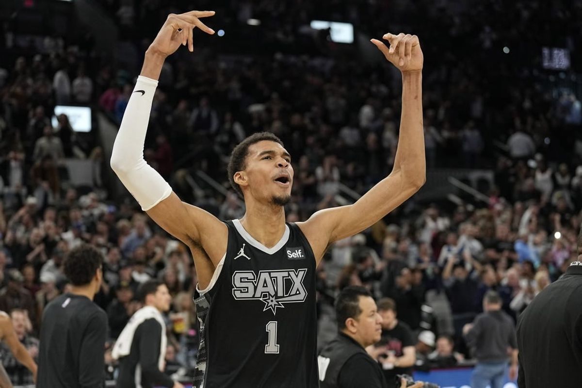 Jan 27, 2024; San Antonio, Texas, USA; San Antonio Spurs forward Victor Wembanyama (1) reacts after a victory over the Minnesota Timberwolves at Frost Bank Center.