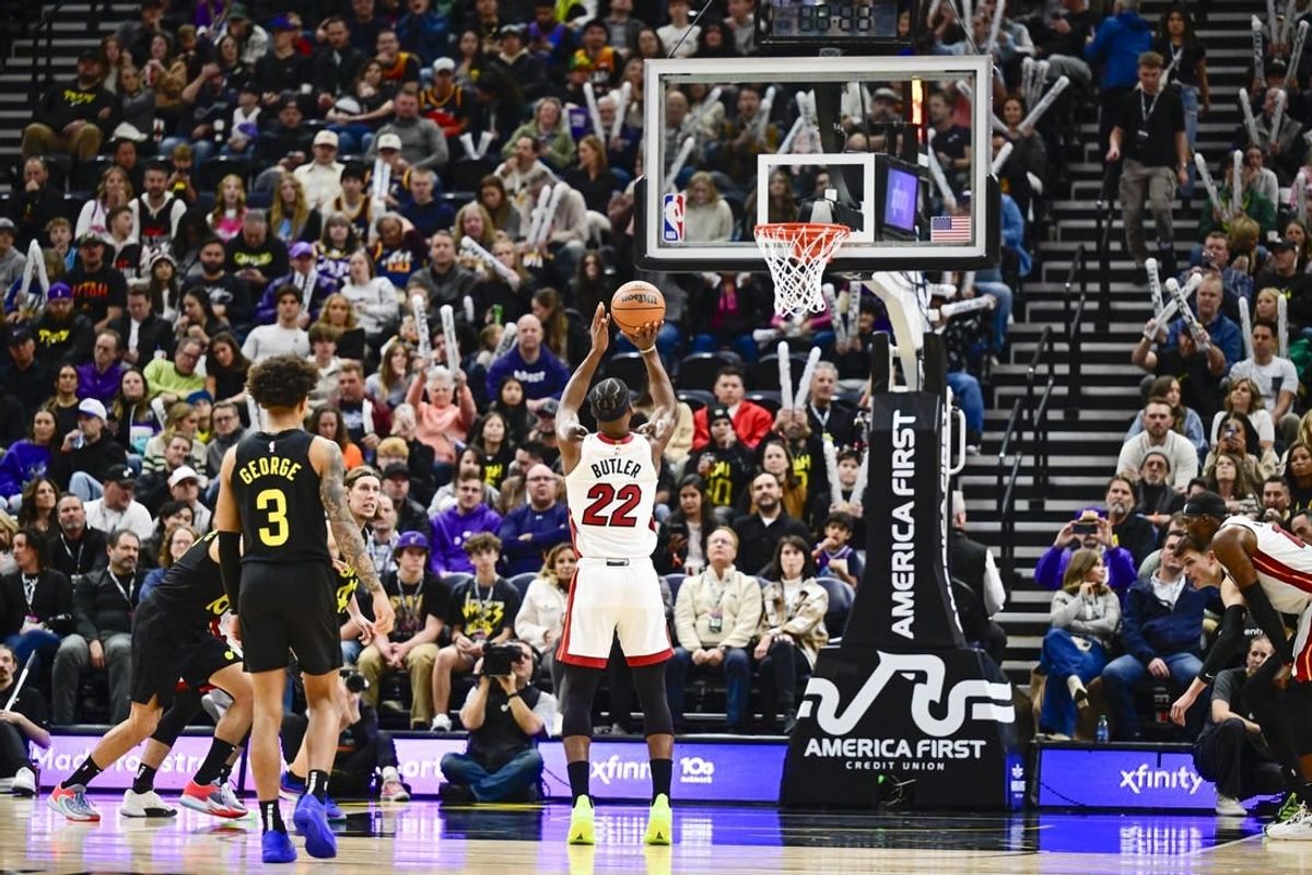 Dec 31, 2022; Salt Lake City, Utah, USA; Miami Heat forward Jimmy Butler (22) takes a free throw shot against the Utah Jazz during the second half at Vivint Arena.