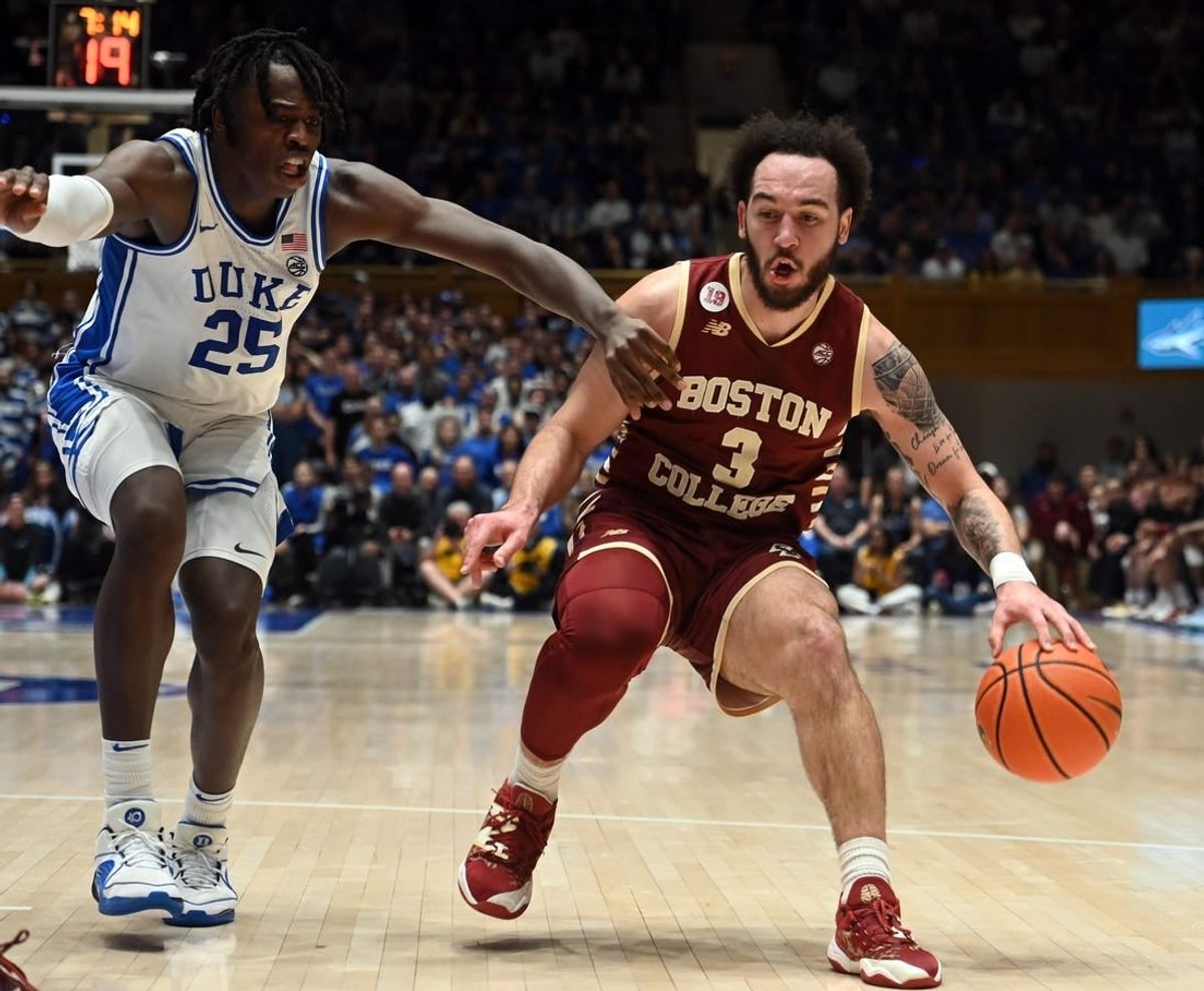 Feb 10, 2024; Durham, North Carolina, USA; Boston College Eagles guard Jaeden Zackery (3) controls the ball against Duke Blue Devils forward Mark Mitchell (25) during the first half  at Cameron Indoor Stadium.