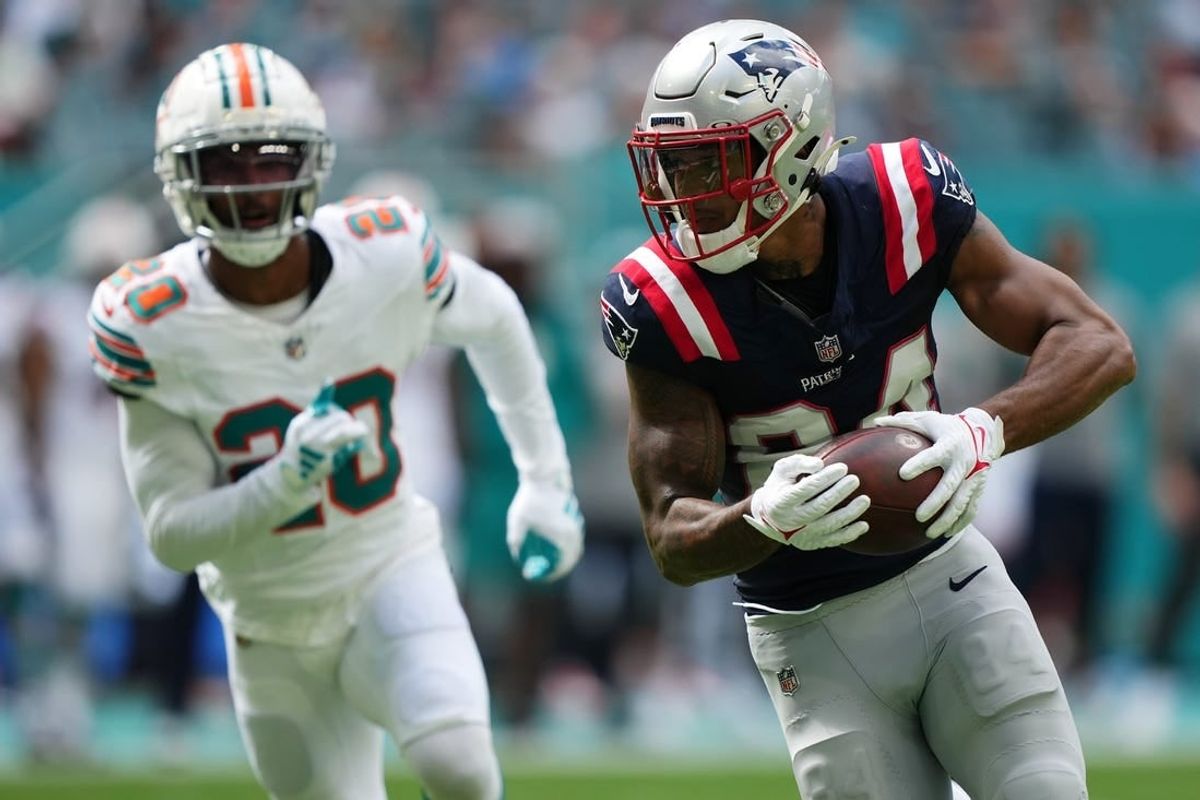 Oct 29, 2023; Miami Gardens, Florida, USA; New England Patriots wide receiver Kendrick Bourne (84) runs the ball for a touchdown against the Miami Dolphins during the first half at Hard Rock Stadium.