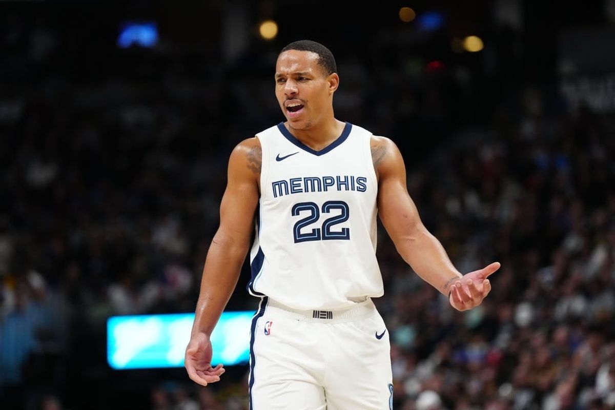 Dec 28, 2023; Denver, Colorado, USA; Memphis Grizzlies guard Desmond Bane (22) reacts in the second half against the Denver Nuggets at Ball Arena.