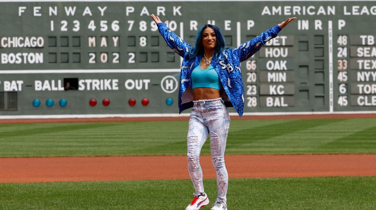 Six time WWE Women’s Champion Sasha Banks throws out the first pitch before the game between the Boston Red Sox and the Chicago White Sox at Fenway Park on May 8, 2022.