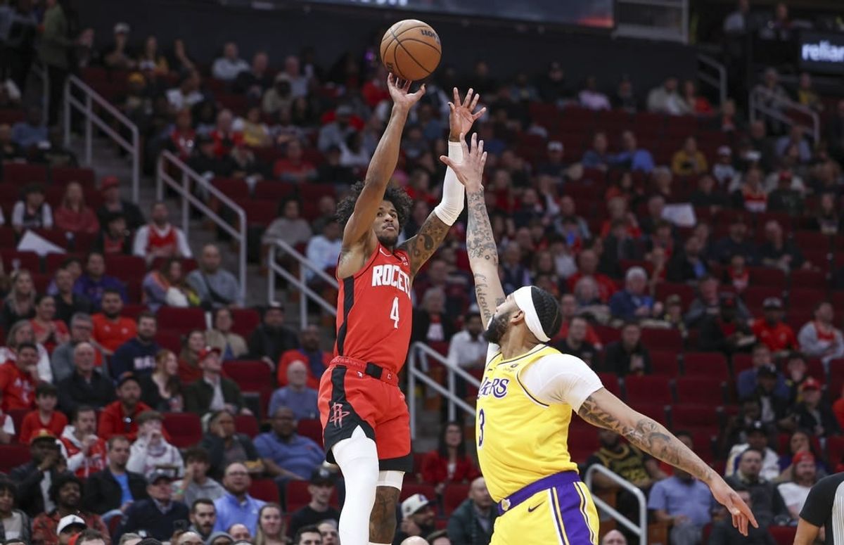 Jan 29, 2024; Houston, Texas, USA; Houston Rockets guard Jalen Green (4) shoots the ball as Los Angeles Lakers forward Anthony Davis (3) defends during the first quarter at Toyota Center.