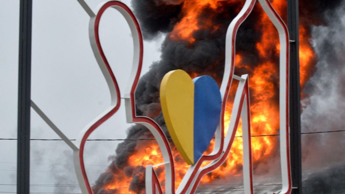 A  burning  building  is  pictured  after  the  shelling  is  said  by  Russian  forces  in  Ukraine’s  second-biggest  city  of  Kharkiv  on  March  3,  2022.