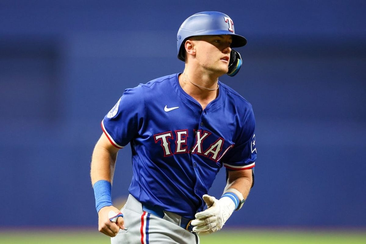 Apr 1, 2024; St. Petersburg, Florida, USA;  Texas Rangers third baseman Josh Jung (6) runs the bases after hitting a three run home run against the Tampa Bay Rays in the first inning at Tropicana Field.