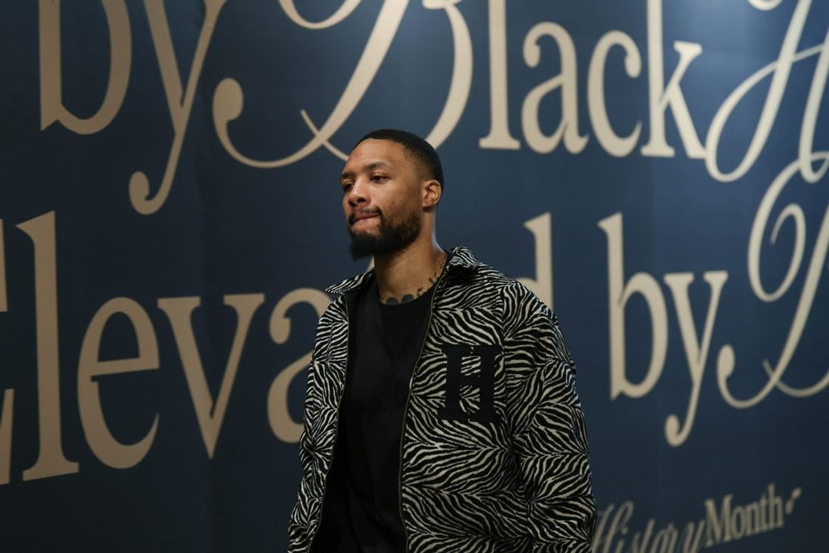 Feb 4, 2024; Salt Lake City, Utah, USA;  Milwaukee Bucks guard Damian Lillard (0) arrives at the Delta Center before the game against the Utah Jazz.