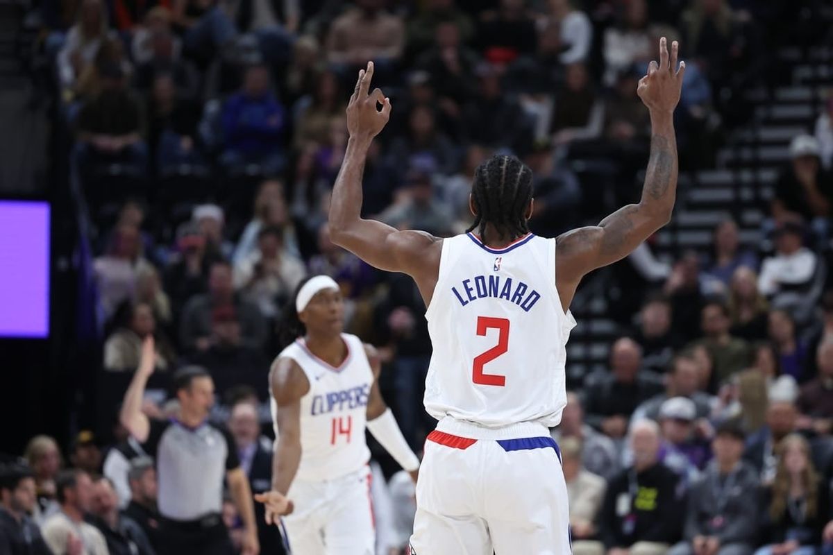 Dec 8, 2023; Salt Lake City, Utah, USA; Los Angeles Clippers forward Kawhi Leonard (2) reads to a three point shot against the Utah Jazz during the second quarter at Delta Center.