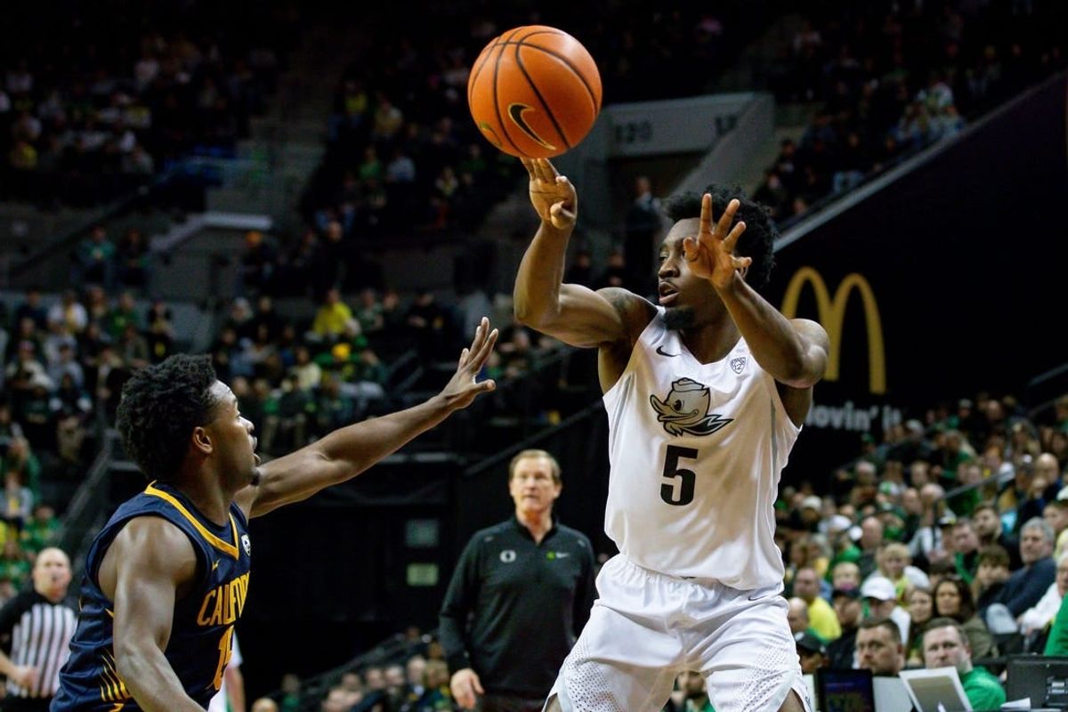 Oregon guard Jermaine Couisnard shoots as the Oregon Ducks host the California Golden Bears Saturday, Jan. 13, 2024 at Matthew Knight Arena in Eugene, Ore.