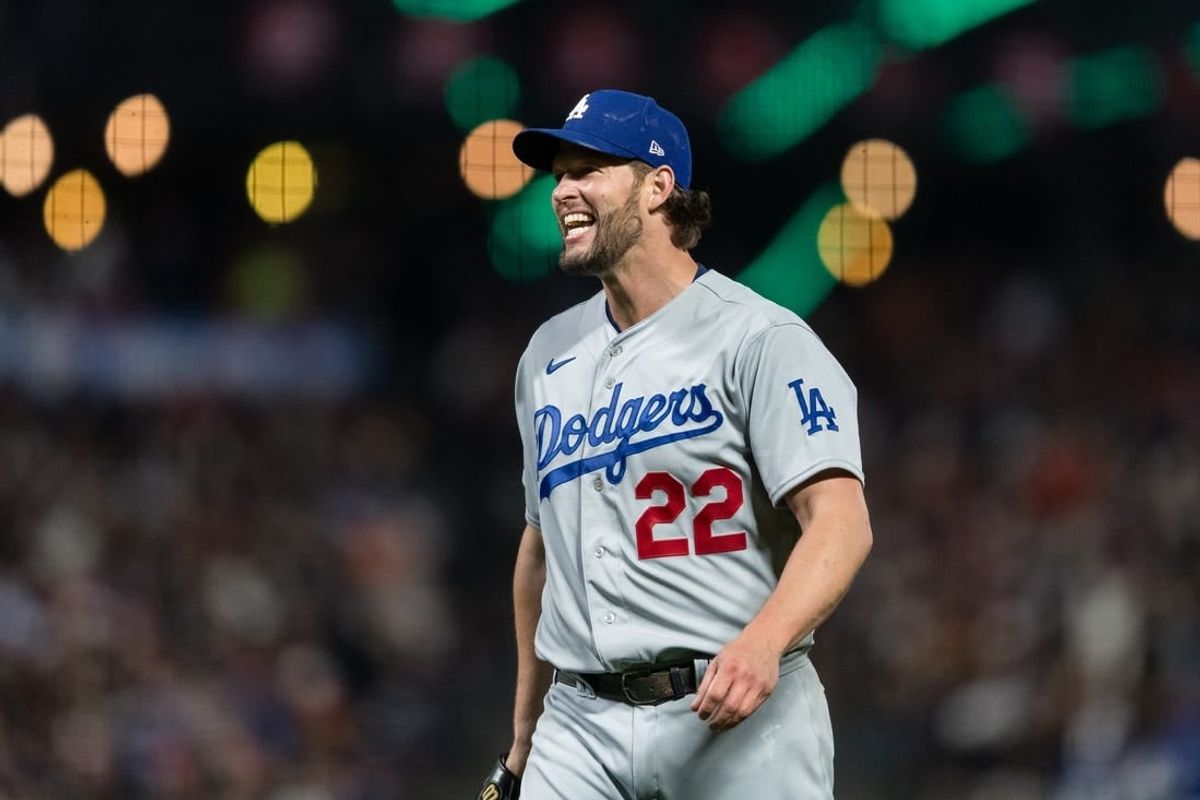 Apr 12, 2023; San Francisco, California, USA;  Los Angeles Dodgers starting pitcher Clayton Kershaw (22) reacts after walking a San Francisco Giants batter during the fifth inning at Oracle Park.