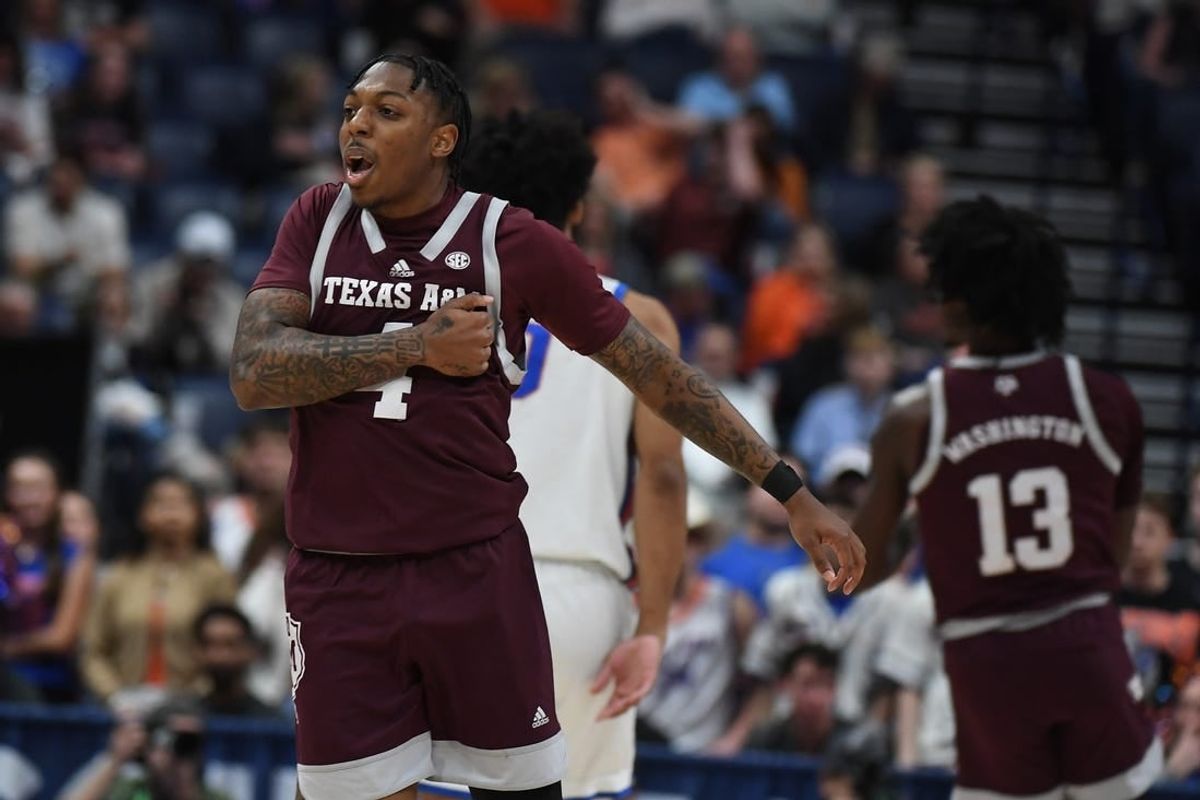 Mar 16, 2024; Nashville, TN, USA; Texas A&M Aggies guard Wade Taylor IV (4) celebrates after a basket during the first half against the Florida Gators at Bridgestone Arena.