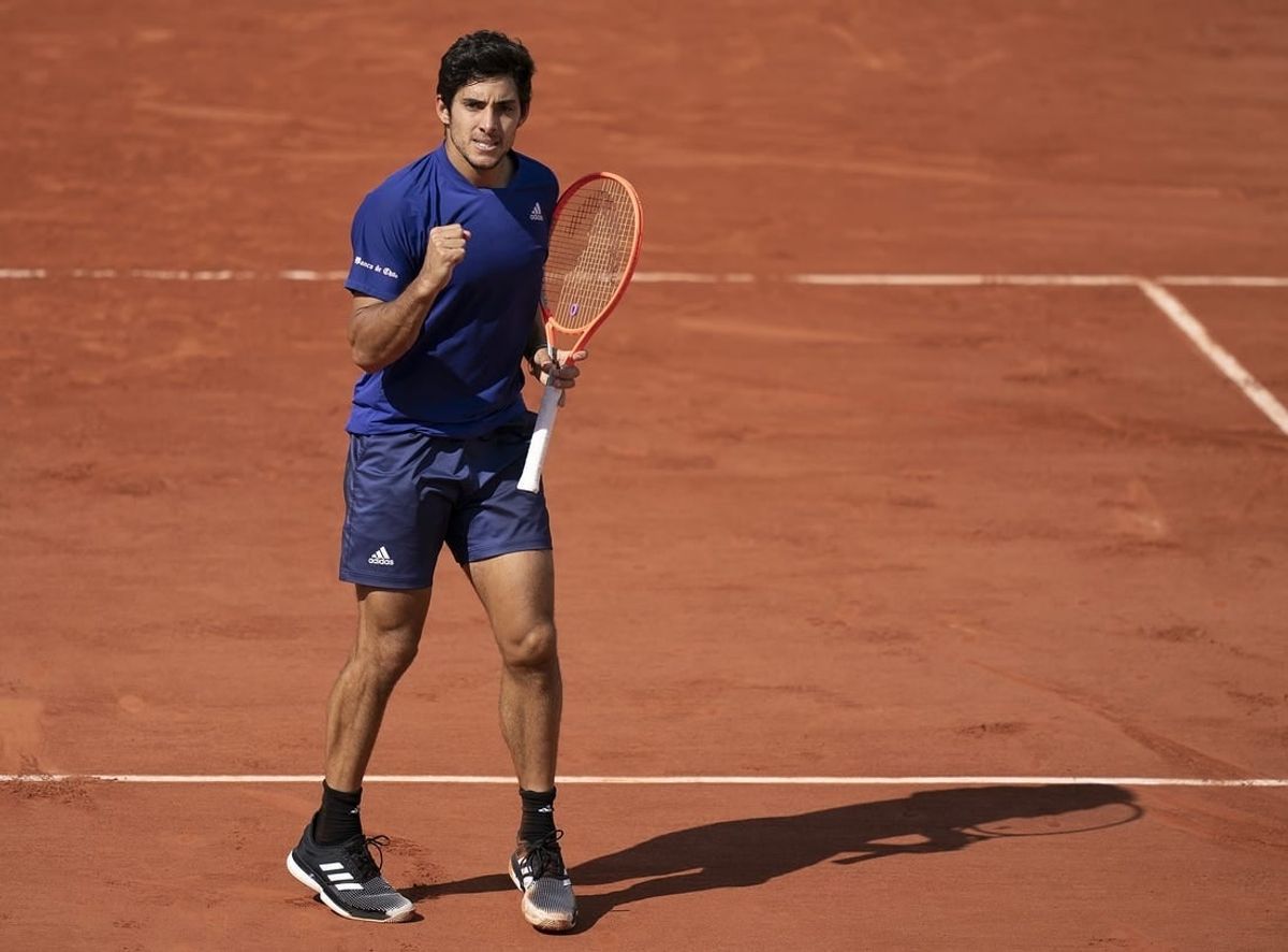 Jun 6, 2021; Paris, France; Cristian Garin (CHI) reacts during his match against Daniil Medvedev (RUS) on day eight of the French Open at Stade Roland Garros.