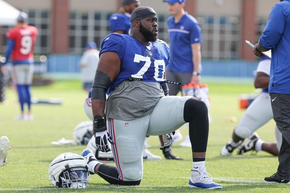 Aug 1, 2023; East Rutherford, NJ, USA; New York Giants offensive tackle Korey Cunningham (70) stretches during training camp at the Quest Diagnostics Training Facility.