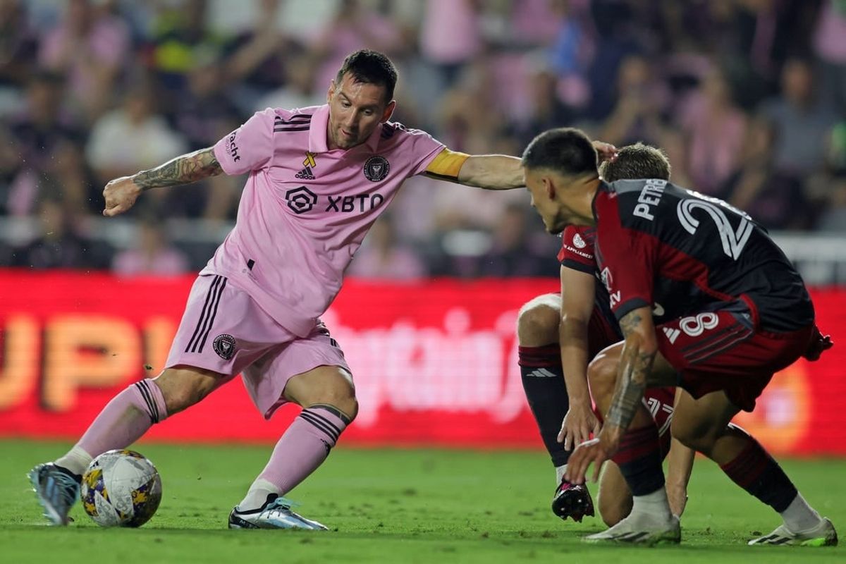 Sep 20, 2023; Fort Lauderdale, Florida, USA; Inter Miami forward Lionel Messi (10) kicks the ball past Toronto FC during the first half at DRV PNK Stadium.