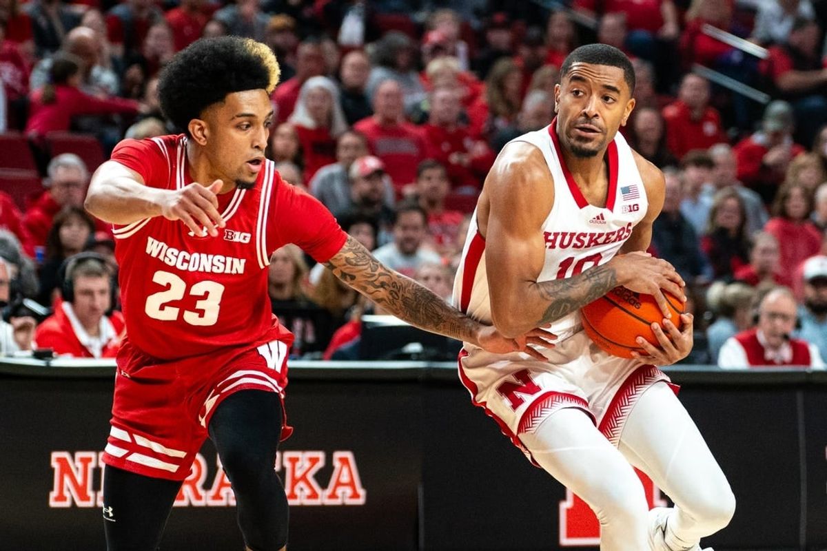 Feb 1, 2024; Lincoln, Nebraska, USA; Nebraska Cornhuskers guard Jamarques Lawrence (10) drives against Wisconsin Badgers guard Chucky Hepburn (23) during the first half at Pinnacle Bank Arena.