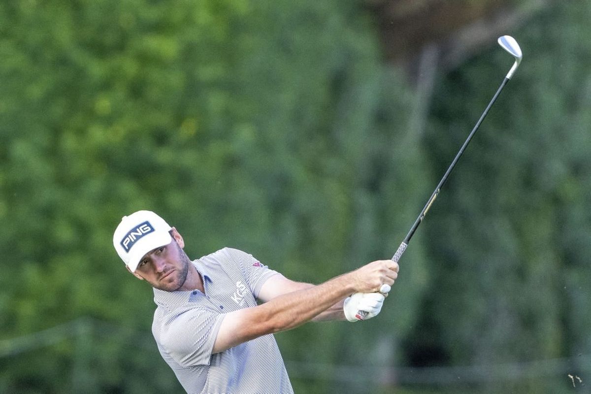 January 12, 2024; Honolulu, Hawaii, USA; Austin Eckroat hits his fairway shot on the eighth hole during the second round of the Sony Open in Hawaii golf tournament at Waialae Country Club.