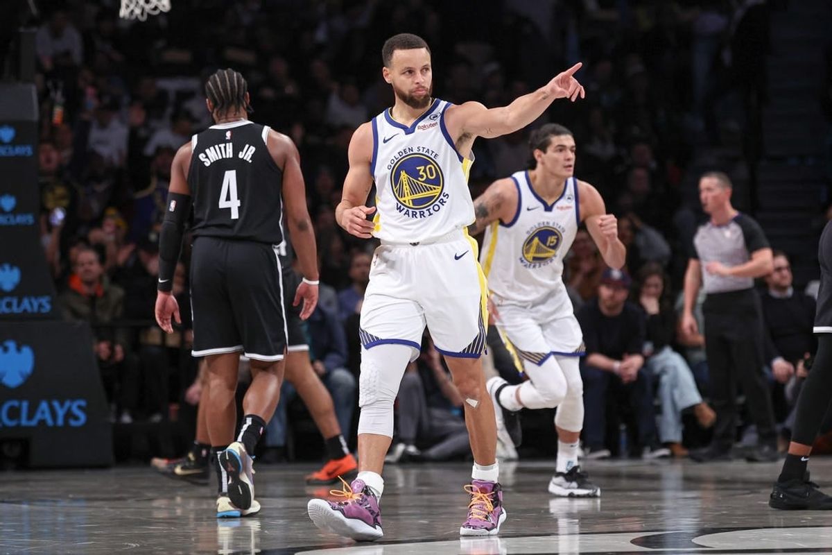 Feb 5, 2024; Brooklyn, New York, USA; Golden State Warriors guard Stephen Curry (30) reacts after making a three point basket during the first half against the Brooklyn Nets at Barclays Center.