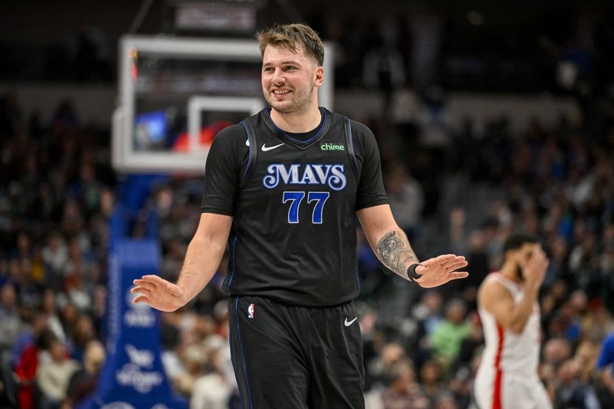 Nov 28, 2023; Dallas, Texas, USA; Dallas Mavericks guard Luka Doncic (77) reacts to a foul call against the Houston Rockets during the second half at the American Airlines Center.
