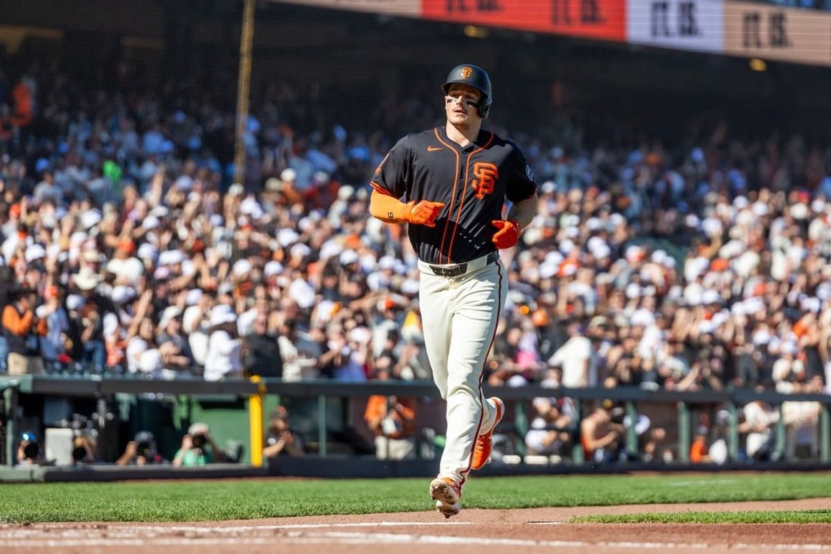May 11, 2024; San Francisco, California, USA; San Francisco Giants third base Matt Chapman (26) runs home after hitting a grand slam against the Cincinnati Reds during the first inning at Oracle Park.