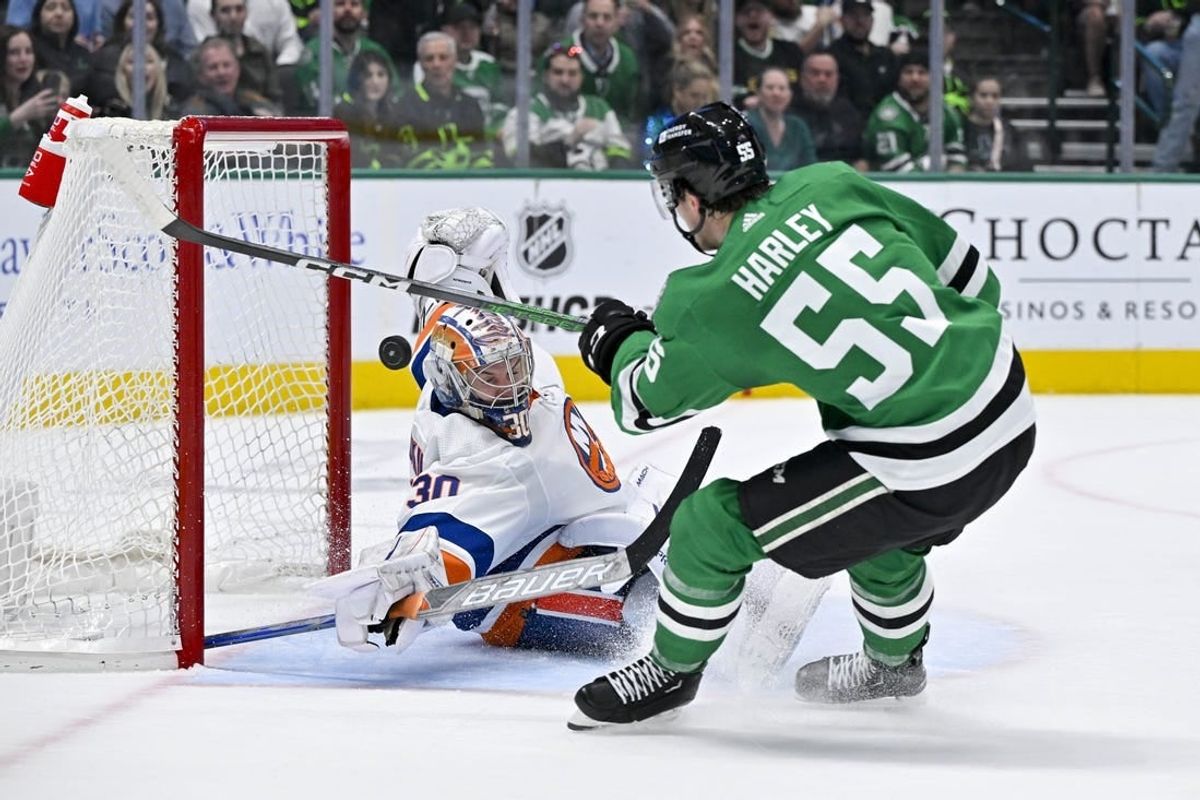 Feb 26, 2024; Dallas, Texas, USA; New York Islanders goaltender Ilya Sorokin (30) stops a breakaway shot by Dallas Stars defenseman Thomas Harley (55) during the second period at the American Airlines Center.