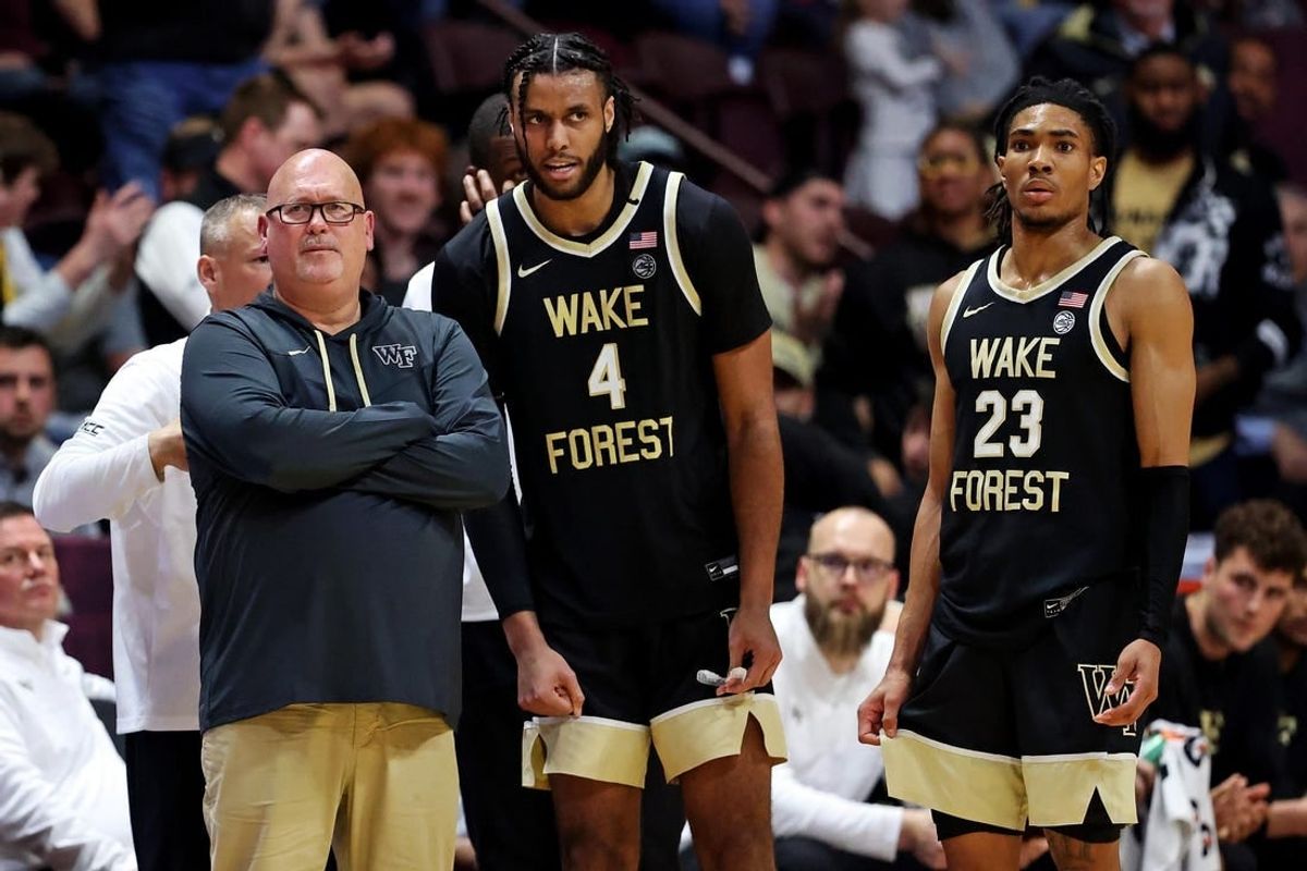 Mar 2, 2024; Blacksburg, Virginia, USA; Wake Forest Demon Deacons head coach Steve Forbes talks with Wake Forest Demon Deacons forward Efton Reid III (4) and guard Hunter Sallis (23) during the second half of the game against the Virginia Tech Hokies at Cassell Coliseum.