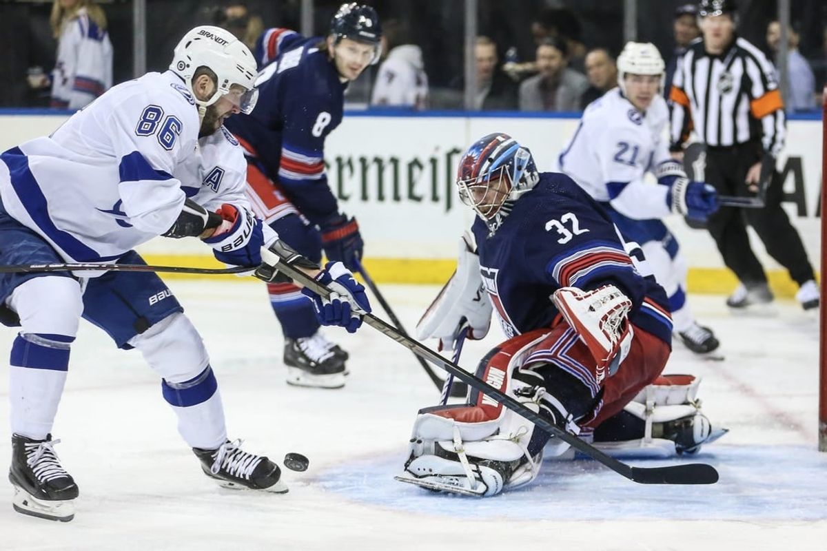 Feb 7, 2024; New York, New York, USA; New York Rangers goaltender Jonathan Quick (32) defends the net against Tampa Bay Lightning right wing Nikita Kucherov (86) in the first period at Madison Square Garden.