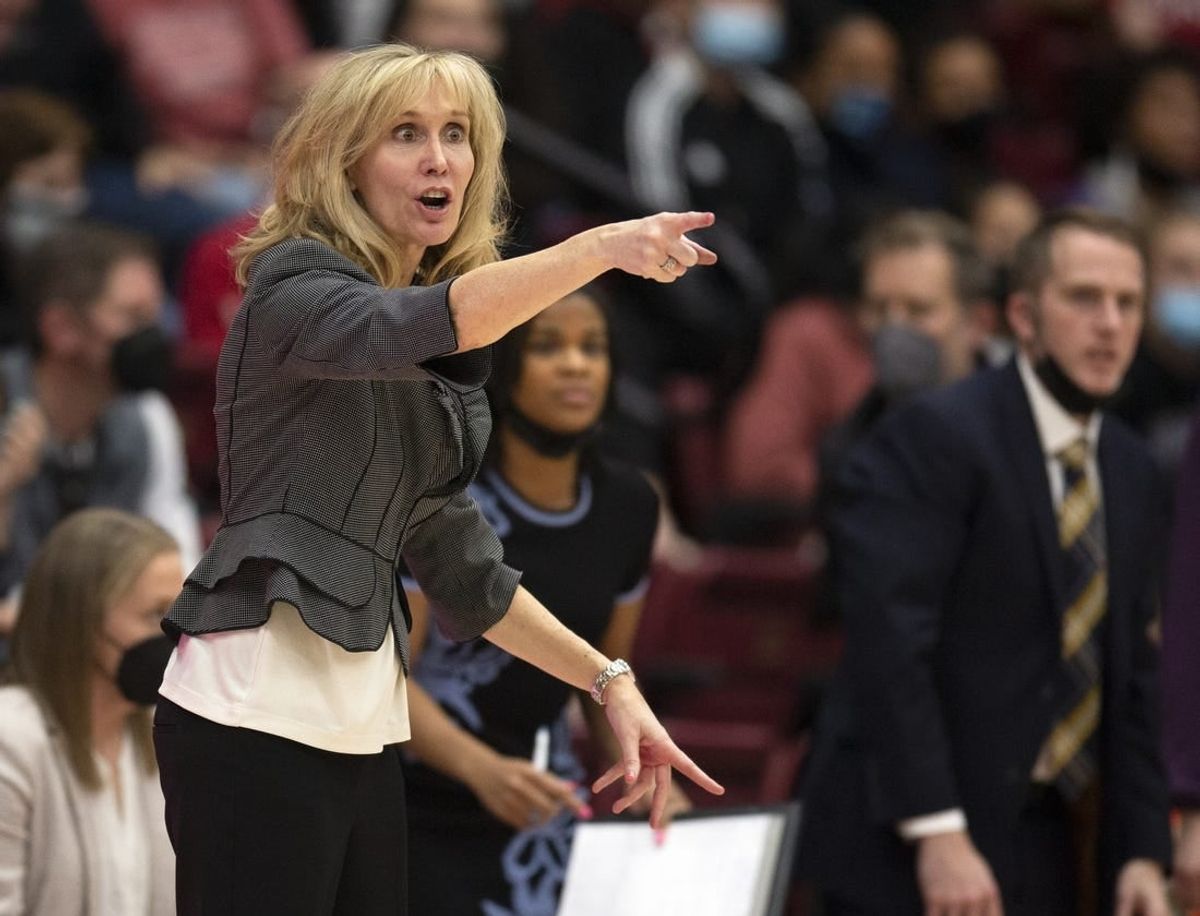 Feb 26, 2022; Stanford, California, USA; Washington Huskies head coach Tina Langley calls in a play to her team during the fourth quarter against the Stanford Cardinal at Maples Pavilion.