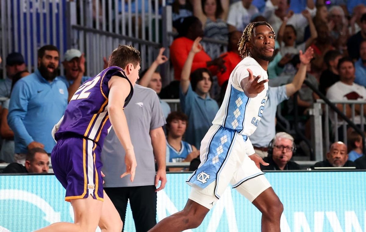 Nov 22, 2023; Paradise Island, BAHAMAS;  North Carolina Tar Heels forward Jae'Lyn Withers (24) reacts after scoring  over Northern Iowa Panthers forward Kyle Pock (22) during the first half at Imperial Arena.