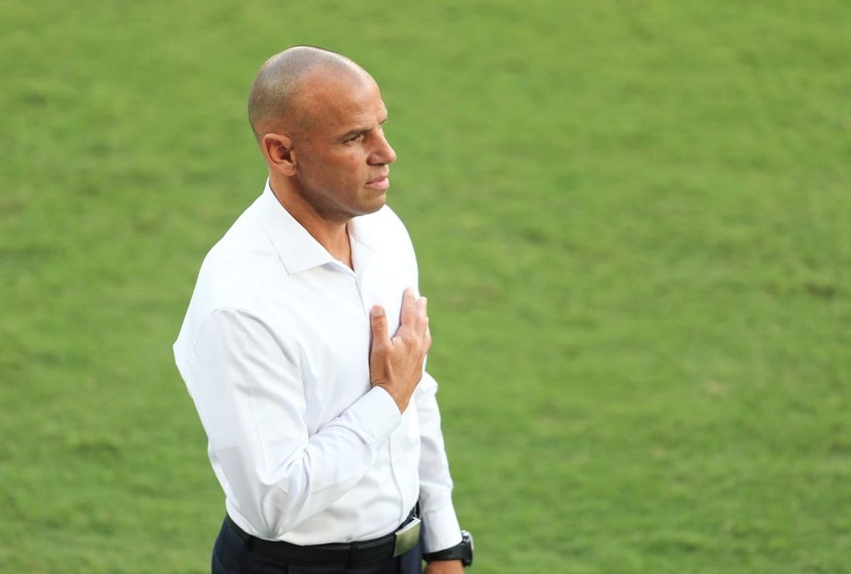 May 22, 2021; Orlando, Florida, USA; Toronto FC head coach Chris Armas stands for the National Anthem before the match against Orlando City at Orlando City Stadium.