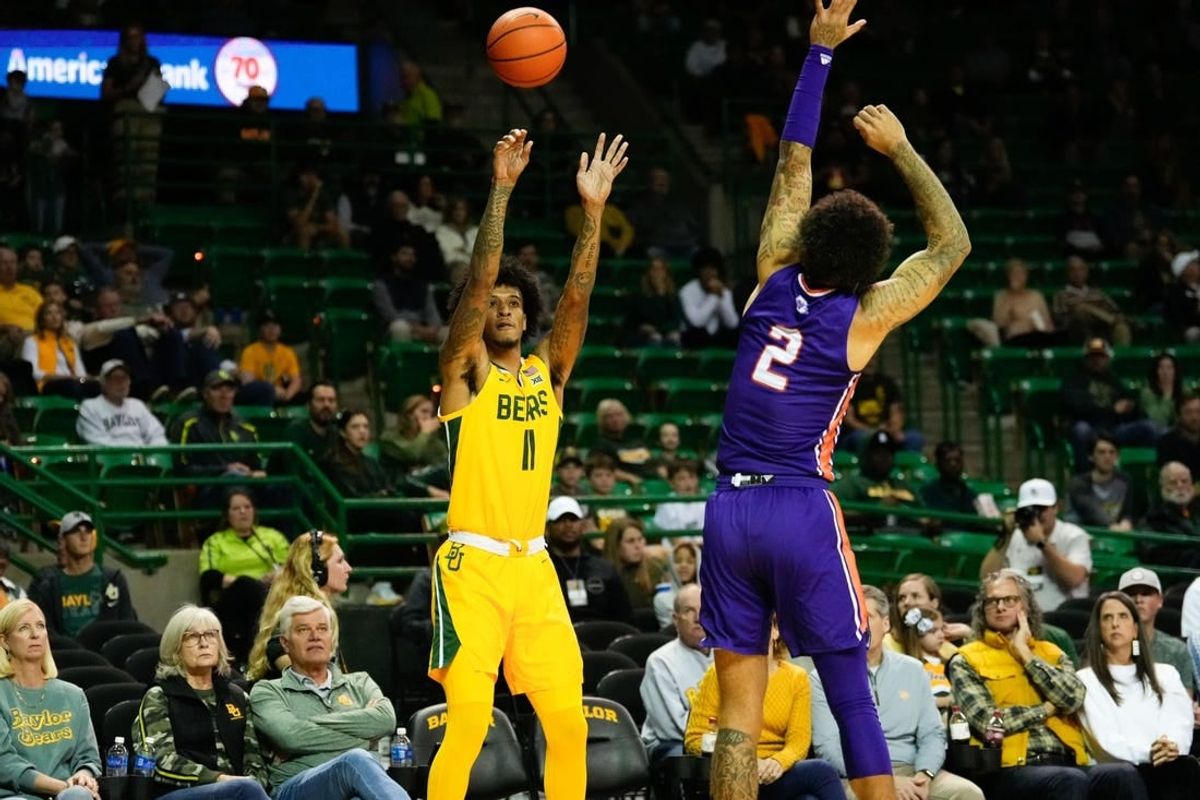 Dec 2, 2023; Waco, Texas, USA; Baylor Bears forward Jalen Bridges (11) scores a three point basket against Northwestern State Demons guard Jamison Epps (2) during the first half at Ferrell Center.