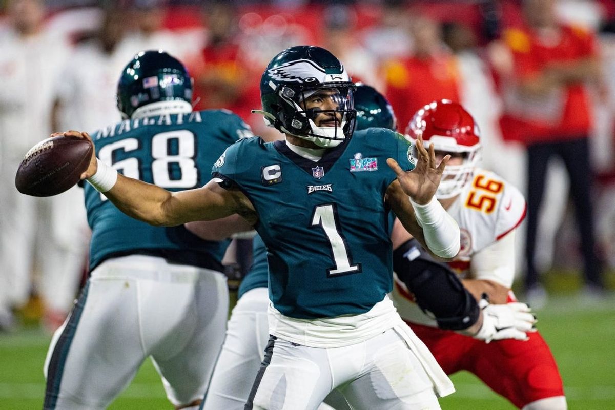 Feb 12, 2023; Glendale, Arizona, US; Philadelphia Eagles quarterback Jalen Hurts (1) throws the ball against the Kansas City Chiefs in Super Bowl LVII at State Farm Stadium.