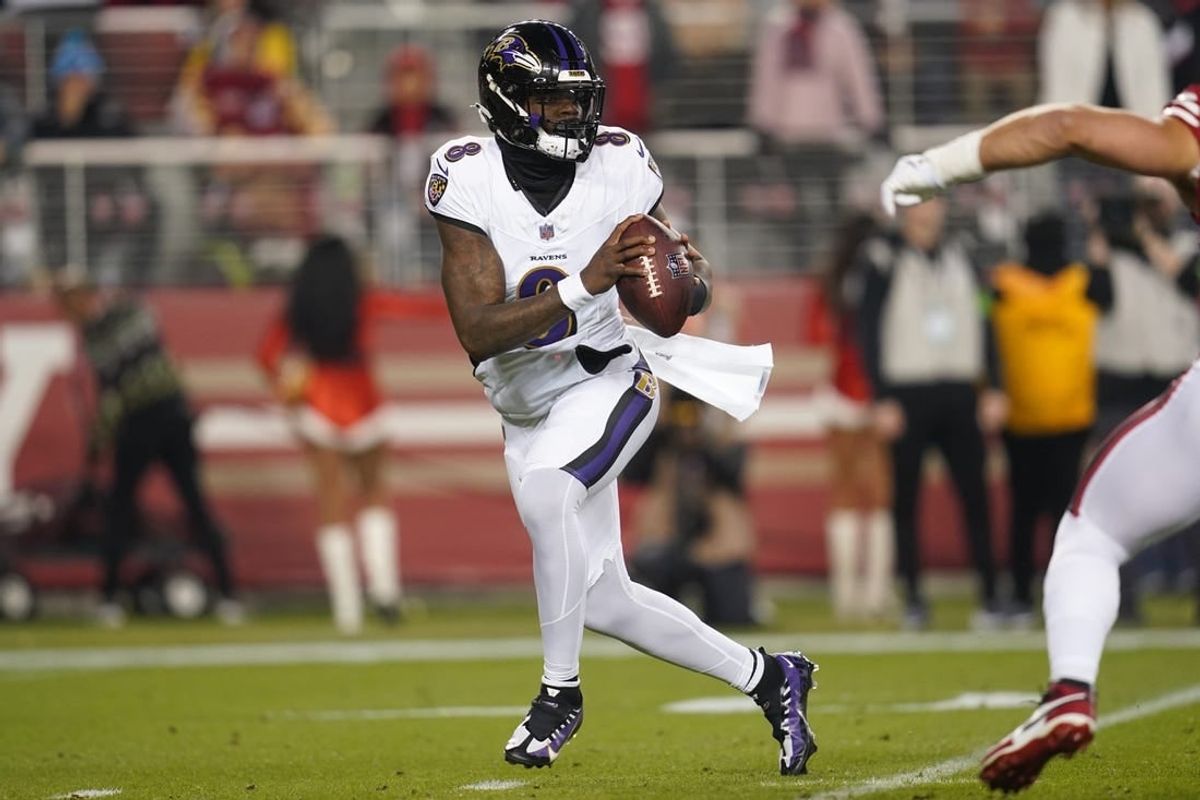 Dec 25, 2023; Santa Clara, California, USA; Baltimore Ravens quarterback Lamar Jackson (8) looks to throw a pass against the San Francisco 49ers in the first quarter at Levi's Stadium.