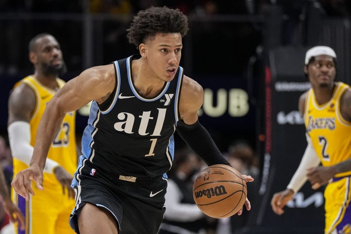 Jan 30, 2024; Atlanta, Georgia, USA; Atlanta Hawks forward Jalen Johnson (1) runs to the basket after stealing the ball against the Los Angeles Lakers during the second half at State Farm Arena.