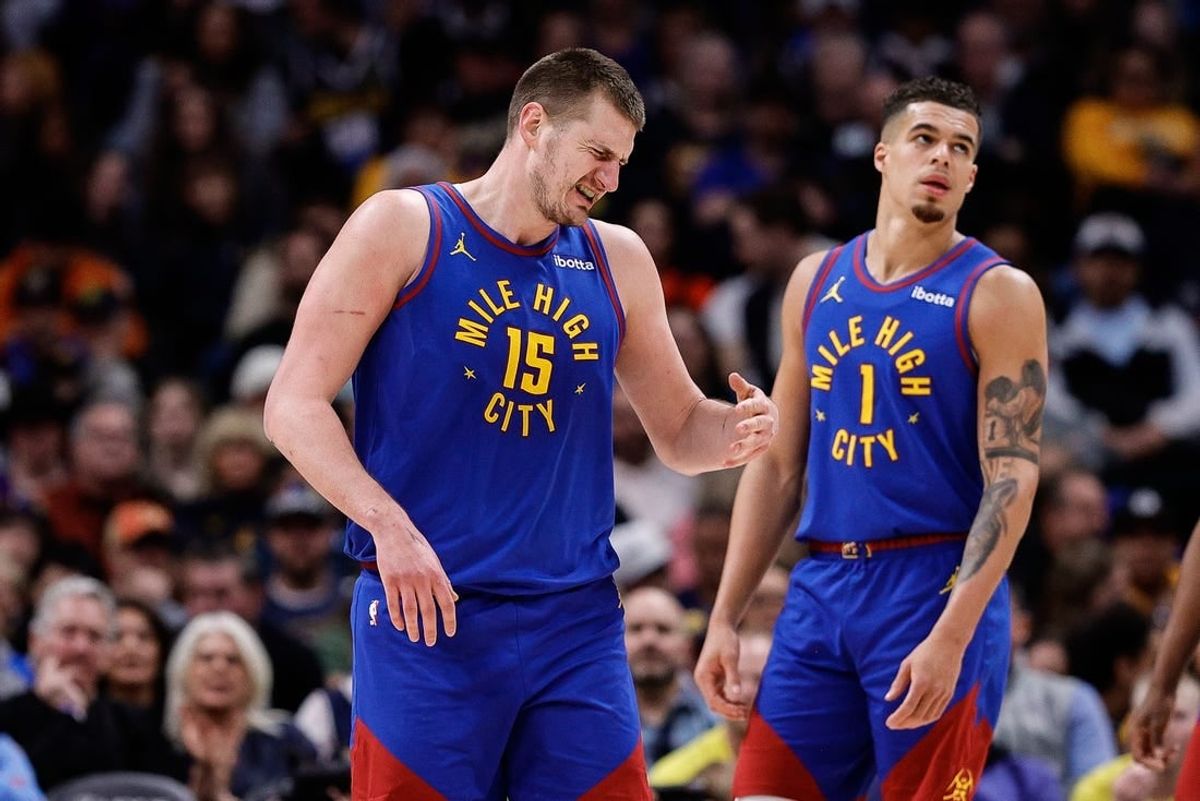 Mar 9, 2024; Denver, Colorado, USA; Denver Nuggets center Nikola Jokic (15) reacts after a play in the second quarter against the Utah Jazz at Ball Arena.