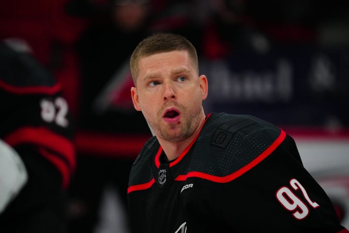 Mar 14, 2024; Raleigh, North Carolina, USA; Carolina Hurricanes center Evgeny Kuznetsov (92) looks on against the Florida Panthers during the warmups before the game against the Florida Panthers at PNC Arena.