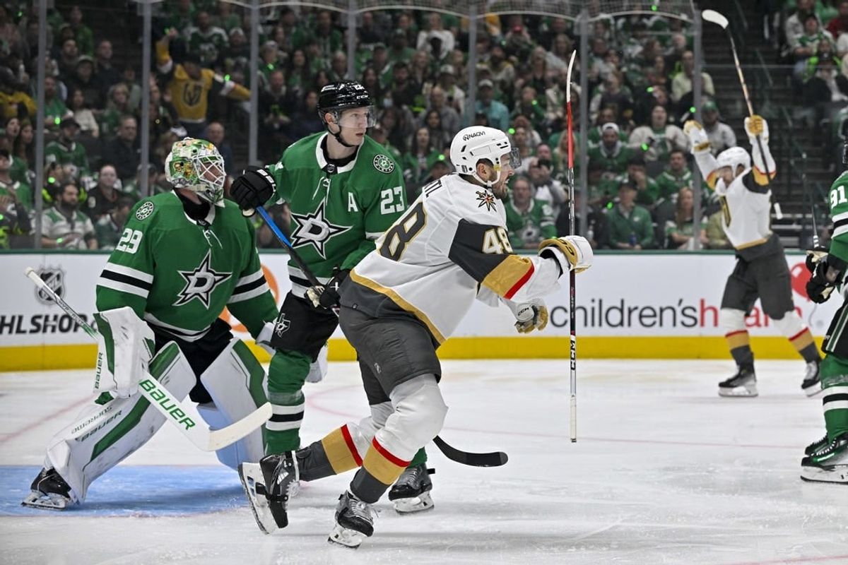 Apr 22, 2024; Dallas, Texas, USA; Vegas Golden Knights center Tomas Hertl (48) celebrates a goal scored by right wing Mark Stone (not pictured) against Dallas Stars goaltender Jake Oettinger (29) as defenseman Esa Lindell (23) looks on during the first period in game one of the first round of the 2024 Stanley Cup Playoffs at the American Airlines Center.