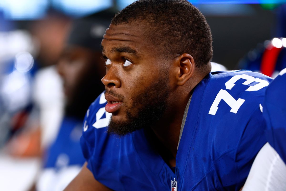 Giants lineman Evan Neal apologized for demeaning fans who make less money than he does.