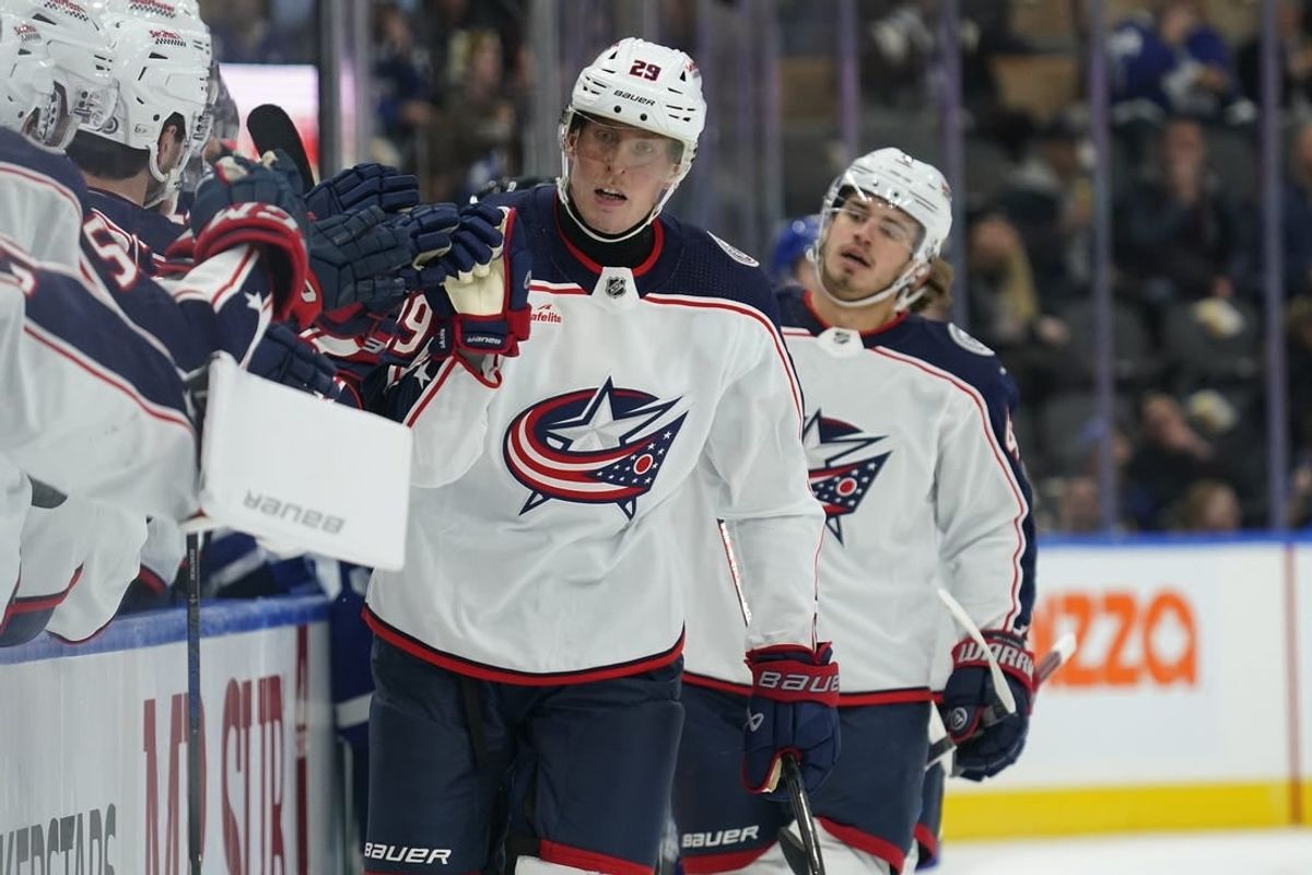 Dec 14, 2023; Toronto, Ontario, CAN; Columbus Blue Jackets forward Patrik Laine (29) gets congratulated after scoring against the Toronto Maple Leafs during the first period at Scotiabank Arena.