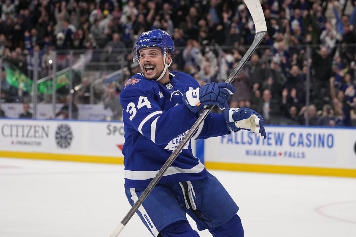 Dec 14, 2023; Toronto, Ontario, CAN; Toronto Maple Leafs forward Auston Matthews (34) reacts after scoring the tying goal to send the game to overtime against the Columbus Blue Jackets during the third period at Scotiabank Arena.