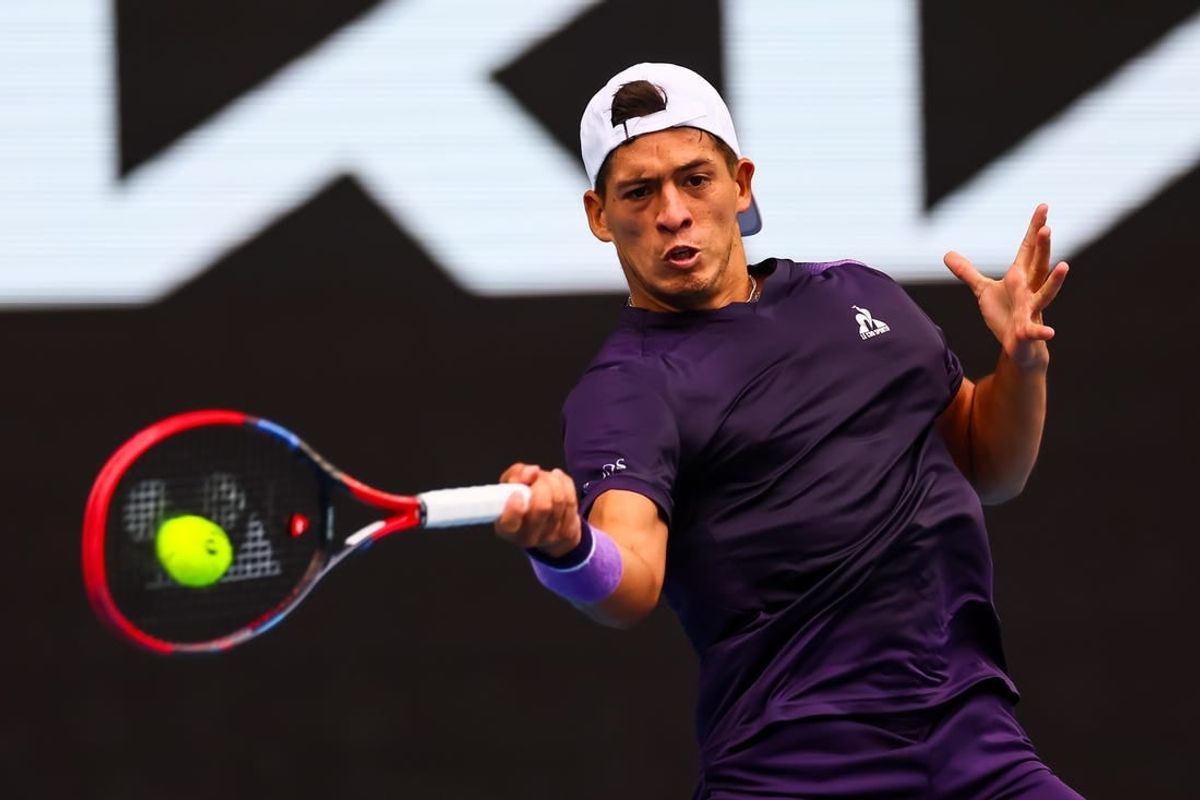 Jan 19, 2024; Melbourne, Victoria, Australia; Sebastian Baez of Argentina plays a shot against Jannik Sinner (not pictured) of Italy in Round 3 of the Men's Singles on Day 6 of the Australian Open tennis at Margaret Court Arena.